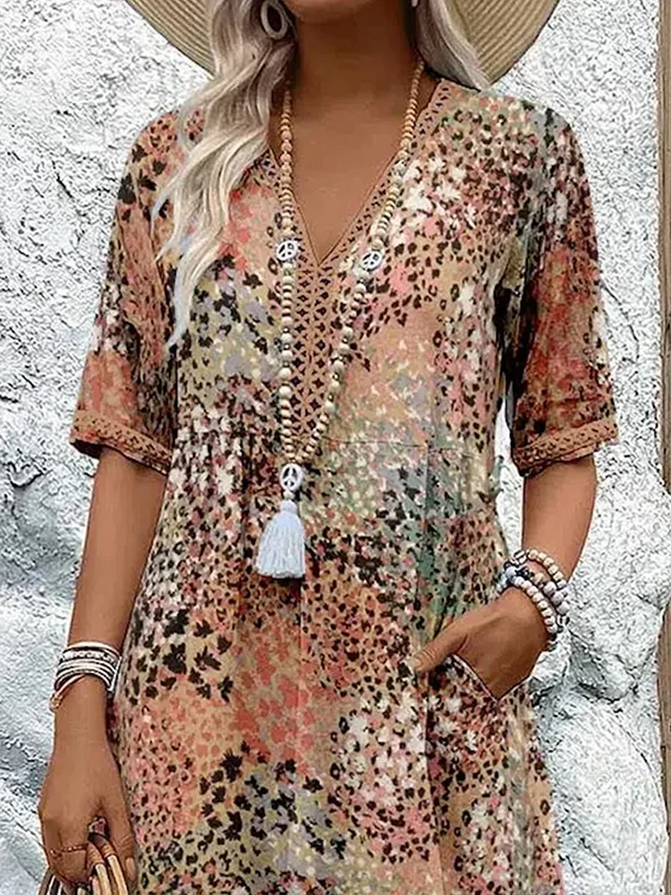 FREYA | ELEGANTE BLOEMIGE MIDI-JURK MET EEN BUIKBEDKKENDE PASVORM