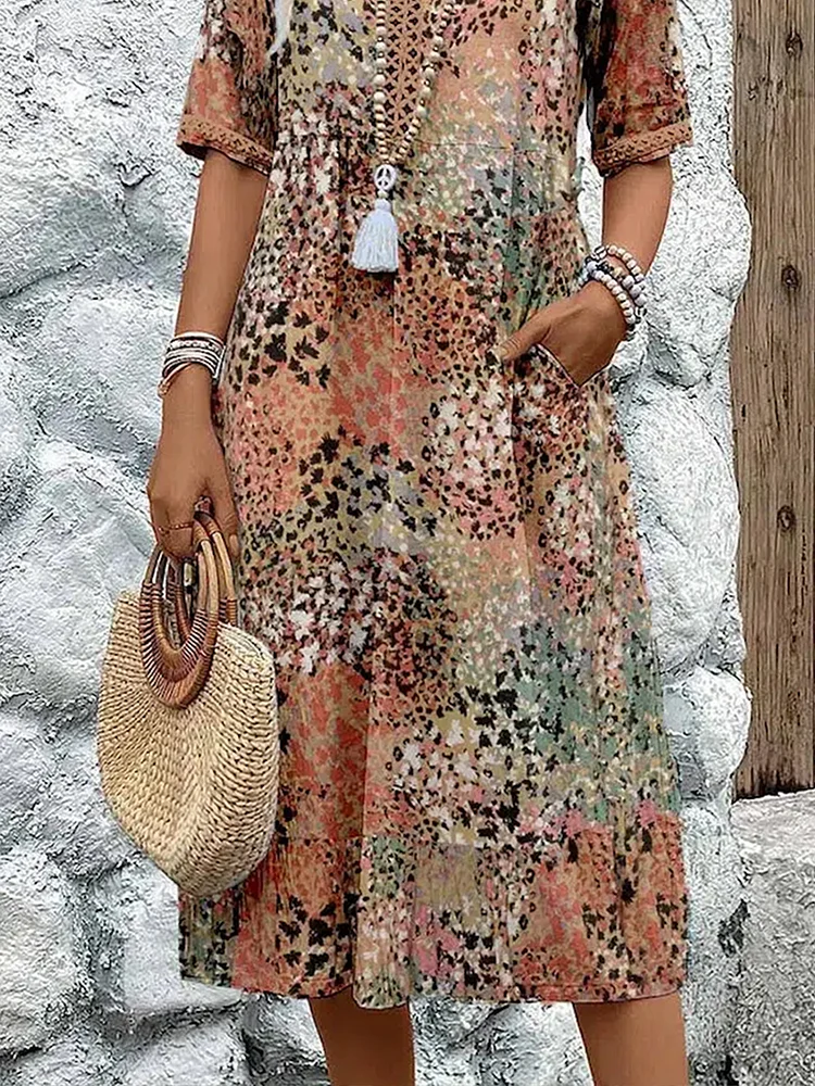 FREYA | ELEGANTE BLOEMIGE MIDI-JURK MET EEN BUIKBEDKKENDE PASVORM