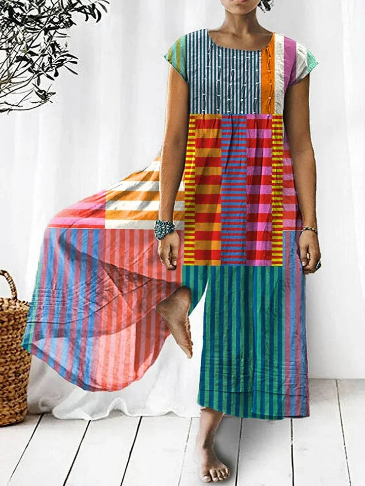 Zara | Levendige patchwork jumpsuit met wijde pijpen, korte mouwen en ronde hals