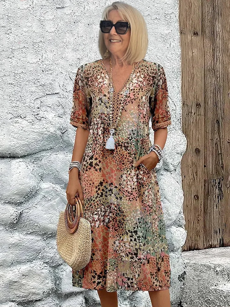 FREYA | ELEGANTE BLOEMIGE MIDI-JURK MET EEN BUIKBEDKKENDE PASVORM