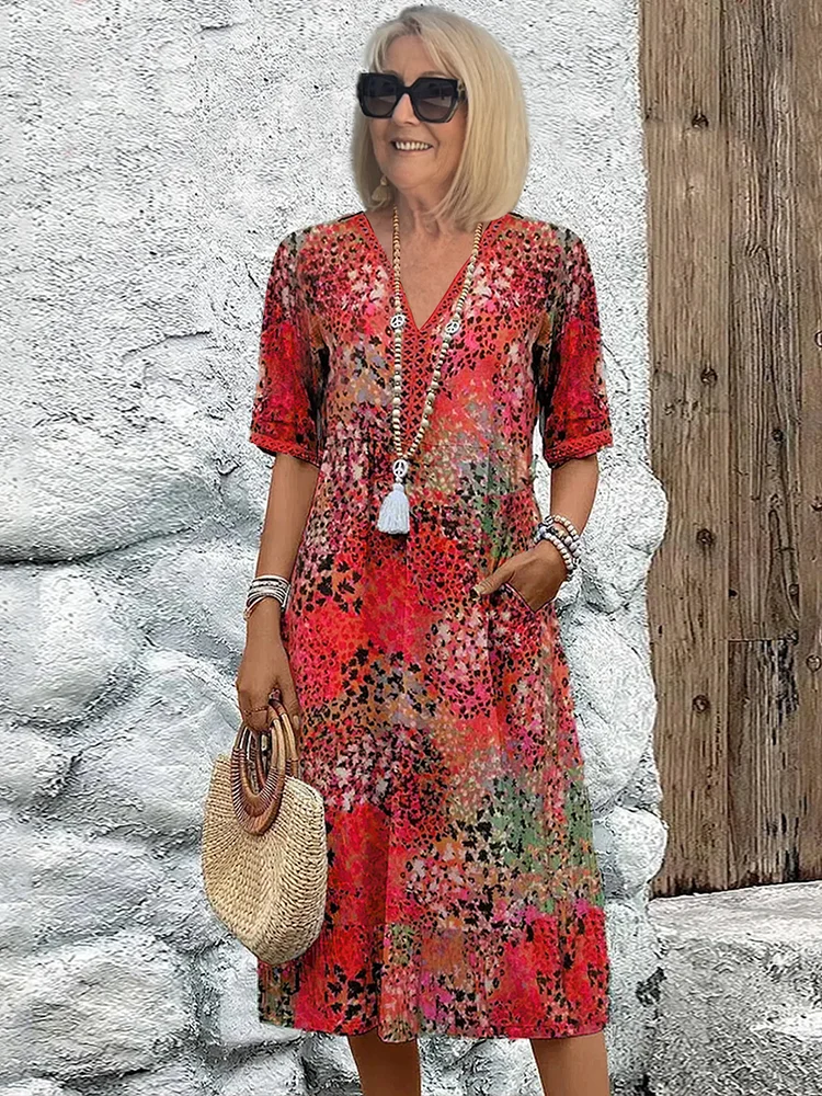FREYA | ELEGANTE BLOEMIGE MIDI-JURK MET EEN BUIKBEDKKENDE PASVORM