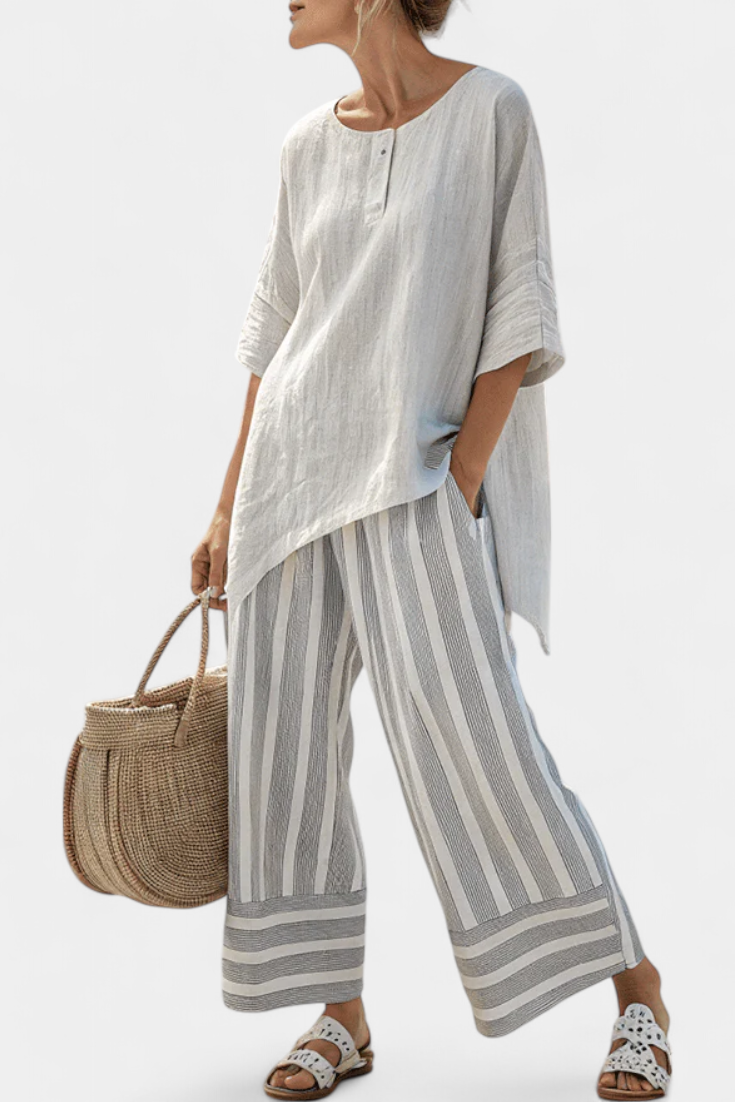Daisy-set met Asymmetrische Blouse en Gestreepte Broek voor een Moderne en Elegante Stijl