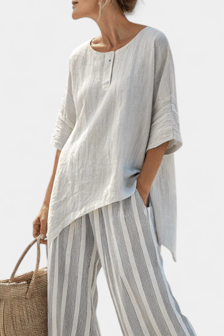 Daisy-set met Asymmetrische Blouse en Gestreepte Broek voor een Moderne en Elegante Stijl